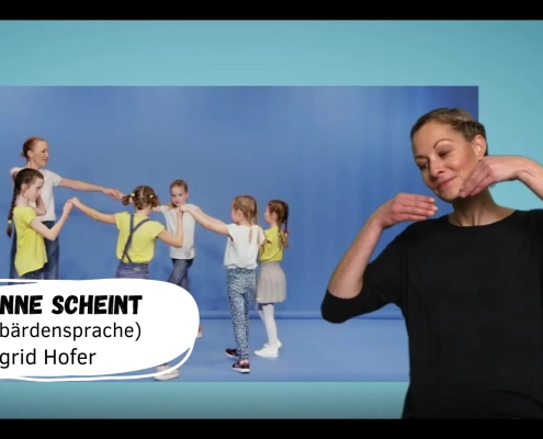 Kinder tanzen und lernen Gebärdensprache.